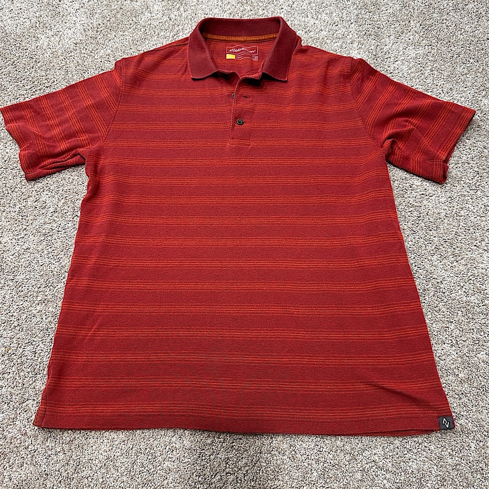 Eddie Bauer red-orange Travex polo shirt